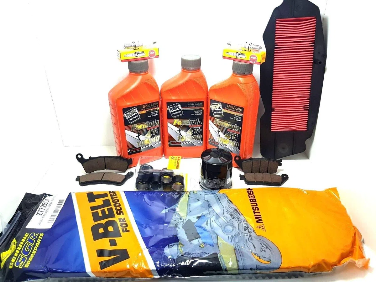 KIT TAGLIANDO OLIO FILTRO CINGHIA RULLI SW T 400 2009 2010 2011 2012 2013